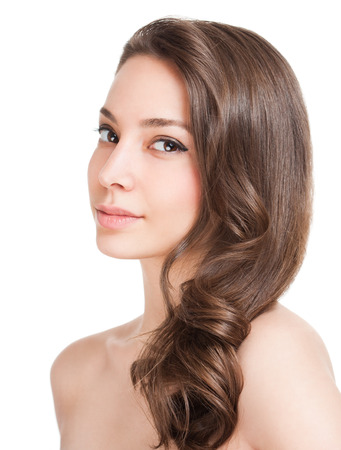 Portrait of a brunette beauty with strong healthy hair.の写真素材