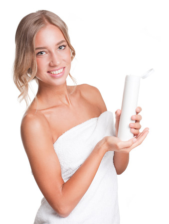 Portrait of a blond beauty with perfect tanned skin.の写真素材