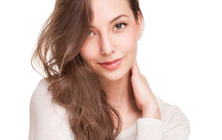 Portraits of a charming young expressive brunette beauty.の写真素材