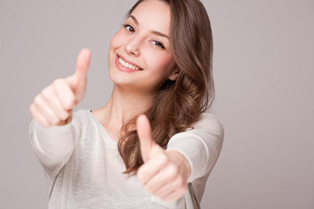 Portraits of a charming young expressive brunette beauty.の写真素材