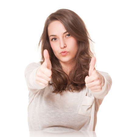 Expressive portrait of a friendly gorgeous young brunette.の写真素材