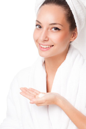 Portrait of a young happy brunette cosmetic beauty.の写真素材