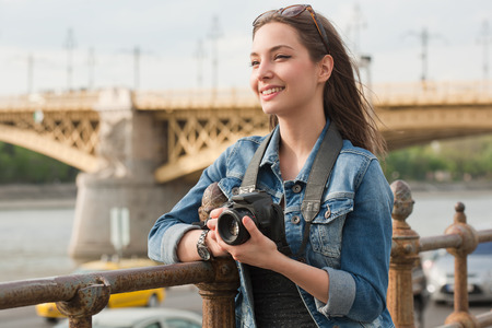 Gorgeous young brunette woman having photography fun.の写真素材