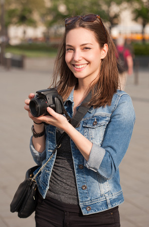 Gorgeous young brunette woman having photography fun.の写真素材