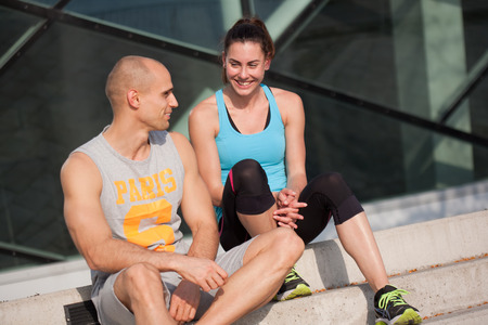 Sporty attractive young couple outdoors.の写真素材