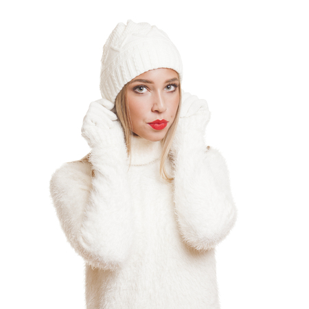 Portrait of a gorgeous young blond woman in winter fashion.の写真素材