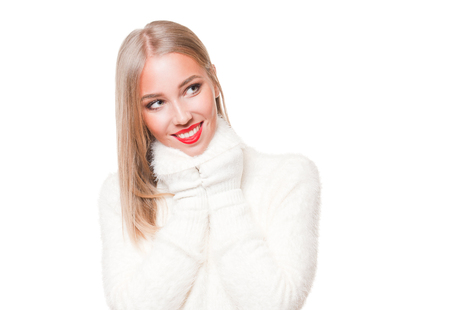 Portrait of a gorgeous young blond woman in winter fashion.の写真素材