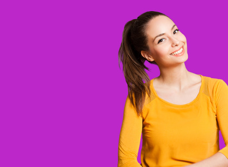 Portrait of an expressive brunette isolated on colorful background.の写真素材