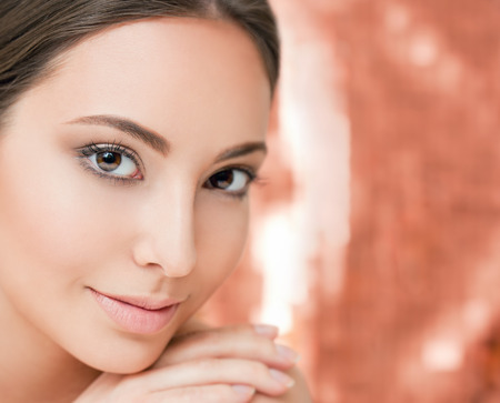 Portrait of a happy smiling brunette makeup beauty.の写真素材