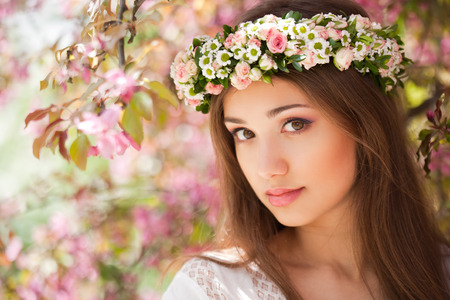 Portrait of a gorgeous spring woman outdoors in nature.の写真素材