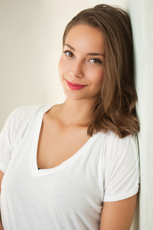 Close portrait of a tanned brunette summer beauty.の写真素材