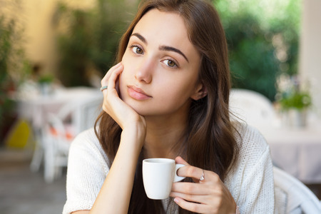Portrait of a gorgeous young woman having gourmet fun in restaurant.の写真素材