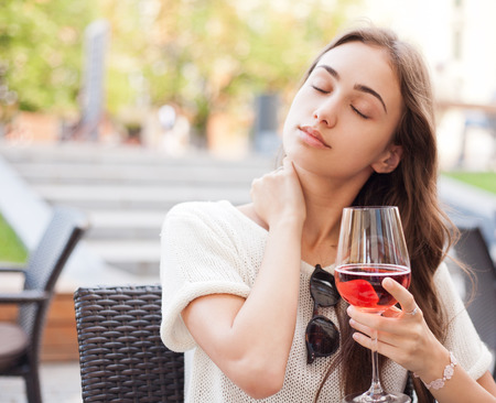 Portrait of a gorgeous young woman having gourmet fun in restaurant.の写真素材