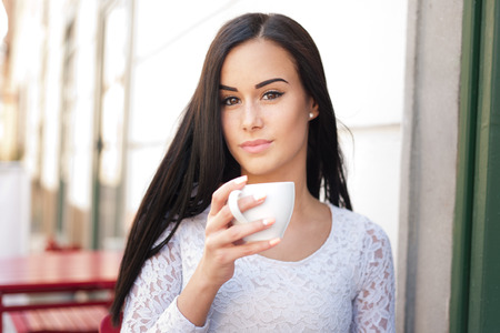 Portrait of stylish brunette fashionable summer beauty outdoors.の写真素材