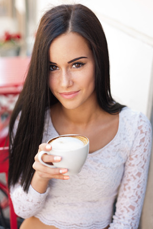 Portrait of stylish brunette fashionable summer beauty outdoors.の写真素材
