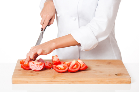 Portrait of a beautiful young brunette chef woman.の写真素材