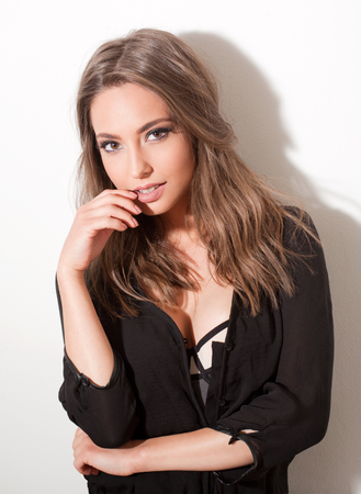 Portrait of a fashionable gorgeous sexy young brunette woman.の写真素材