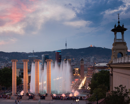 BARCELONA - JUNE 22 Tourist gather to enjoy the Magic Fountain show on Montjuic, on June 22, 2017 in Barcelona, Spain.のeditorial素材