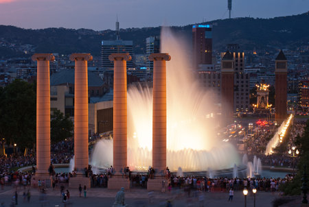 BARCELONA - JUNE 22 Tourist gather to enjoy the Magic Fountain show on Montjuic, on June 22, 2017 in Barcelona, Spain.のeditorial素材