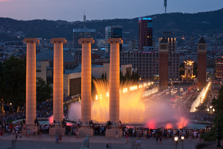 BARCELONA - JUNE 22 Tourist gather to enjoy the Magic Fountain show on Montjuic, on June 22, 2017 in Barcelona, Spain.のeditorial素材