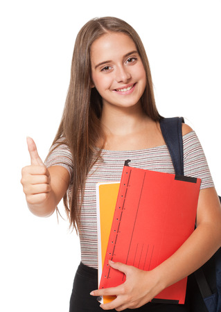 Fashionable young student isolated on white background.の写真素材