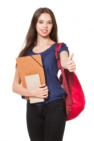 Fashionable young student isolated on white background.の写真素材