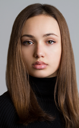 Portrait of a beautiful winter fashion brunette.の写真素材
