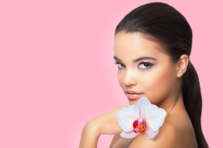 Gorgeous young brunette woman in natural makeup.の写真素材