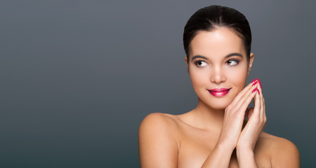 Gorgeous young brunette woman in makeup with ombre lipstick.の写真素材