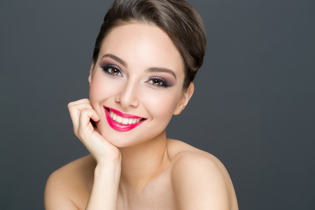 Portrait of a gorgeous brunette in elegant makeup.の写真素材