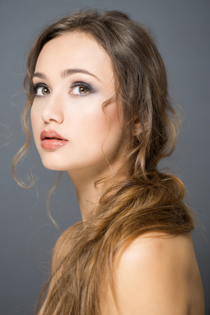 Portrait of a young brunette cosmetics beauty.の写真素材