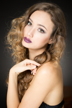 Portrait of a young brunette cosmetics beauty.の写真素材