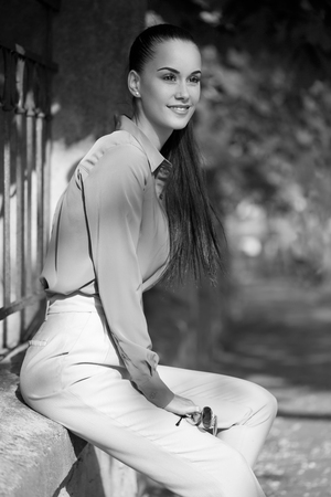 Outdoors portait of stylish young fashion  brunette.の写真素材