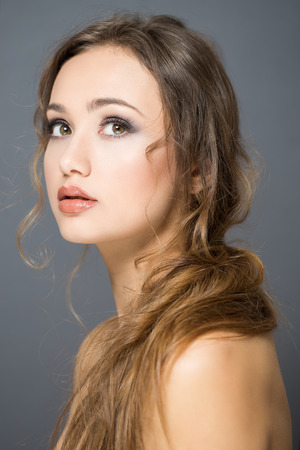 Portrait of a young brunette cosmetics beauty.の写真素材