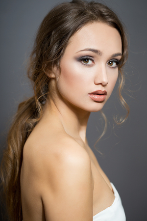 Portrait of a young brunette cosmetics beauty.の写真素材