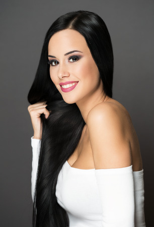 Studio portrait of young brunette cosmetics beauty.の写真素材