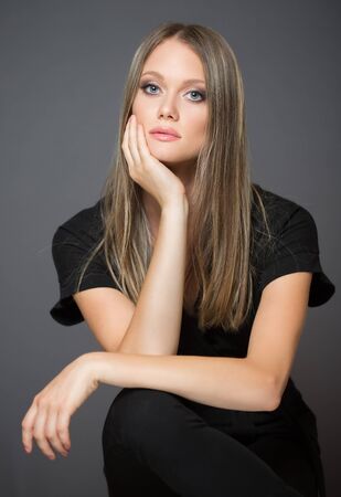 Portrait of a blond cosmetics beauty in light makeup.の写真素材