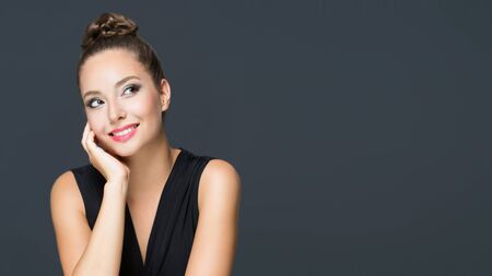 Portrait of a gorgeous brunette in elegant makeup.の写真素材