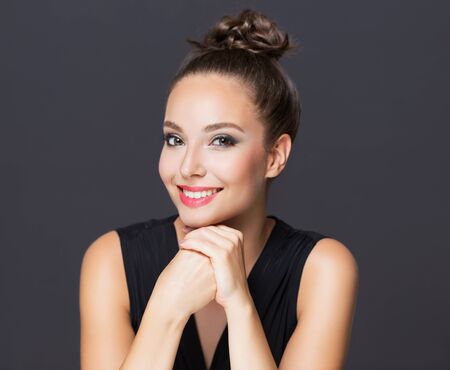 Portrait of a gorgeous brunette in elegant makeup.の写真素材