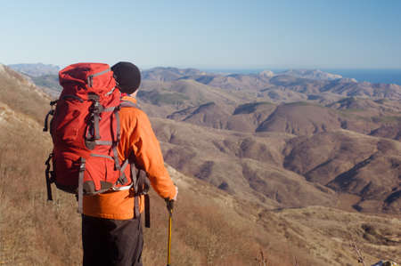 Hiking man with backpackの写真素材