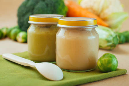 Glass jars with natural vegetable pureeの写真素材