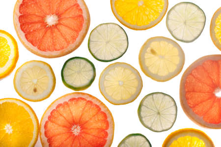 Close up of fresh citrus slices with back lightの写真素材