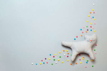 Funny sleeping cat toy with closed eyesの写真素材