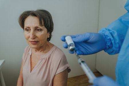 Healthcare worker waiting for  vaccination at hospitalの写真素材
