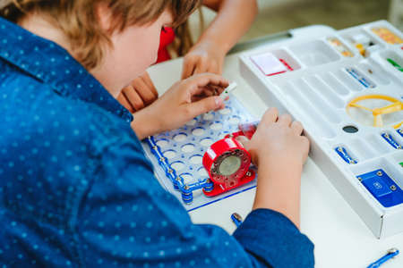 Elementary school student learning in the classroomの写真素材