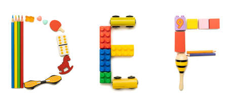 Letters D, E, F made by kids toys isolated on white background. Top view, flat lay.の写真素材
