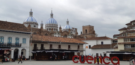 Old cathedral and square with city Cuenca sign. Cuenca / Ecuador.