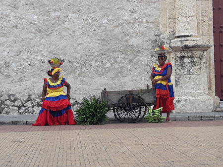 Local colombian women with traditional clothes at city square. Cartagena / Colombia.のeditorial素材