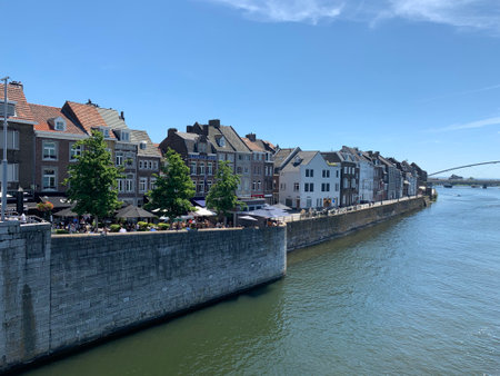 Old houses on the bank of Meuse (Maas) river. Maastricht, Limburg / Netherlands.のeditorial素材