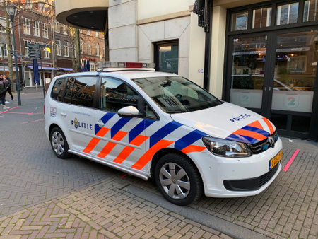 Dutch police (politie) car parked on the sidewalk at Venlo city centre. Venlo, Limburg / Netherlands.のeditorial素材